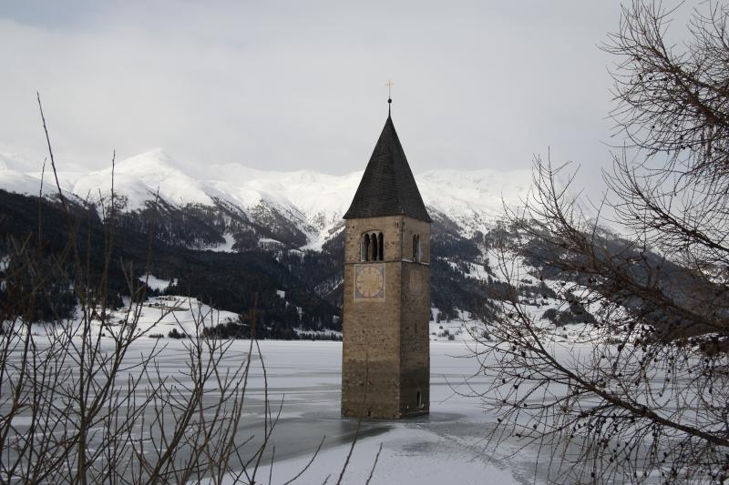 image Church Tower in a frozen Reschen lake