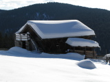 image Snow covered hut at the Moschwald Alm